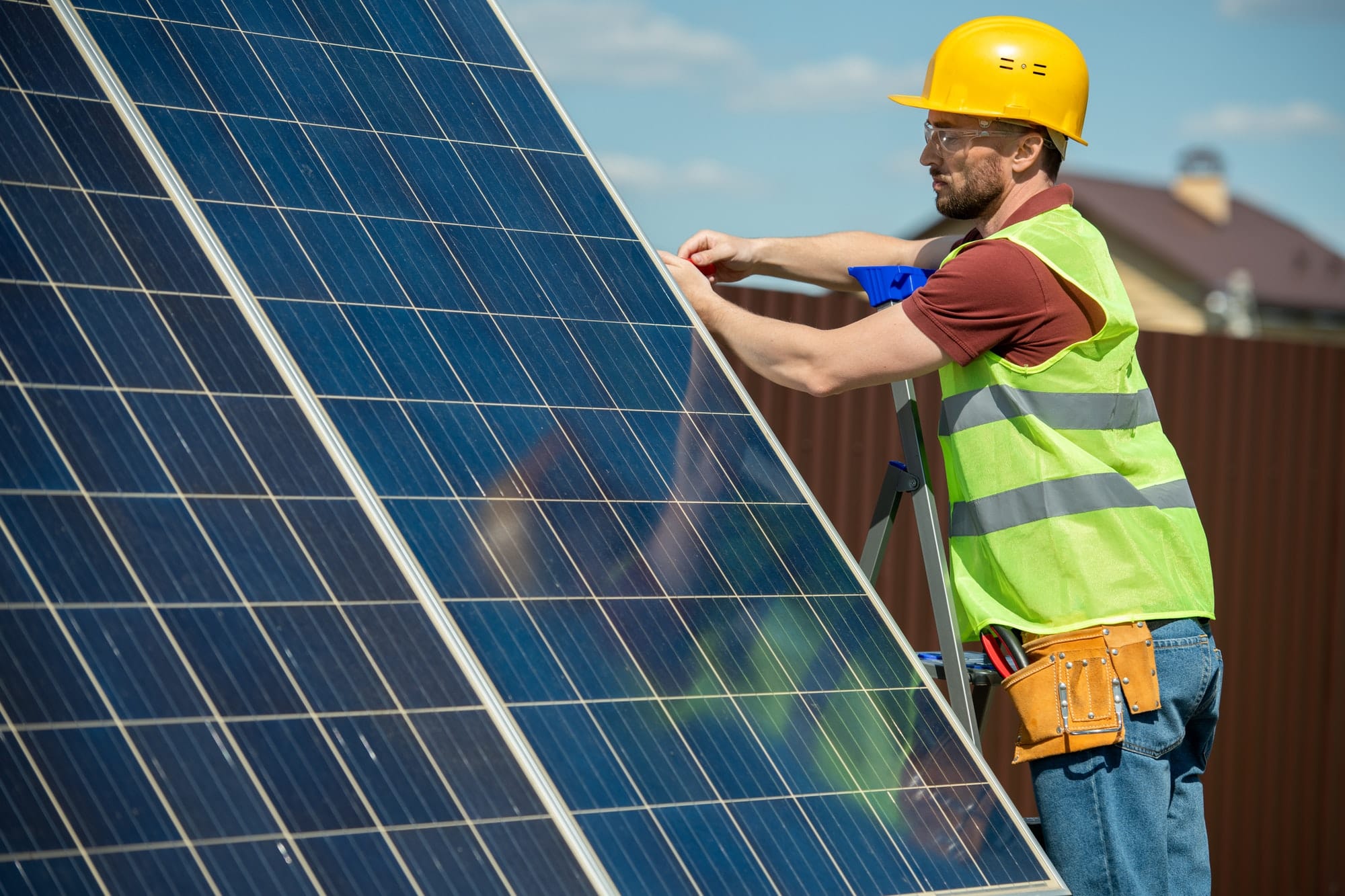 engineer installing solar panel